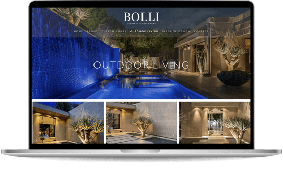 lapmock-bolli-slider A laptop displaying a website for Bolli Design & Development. The homepage features images of outdoor living spaces, including a pool with surrounding modern architecture and landscaping.